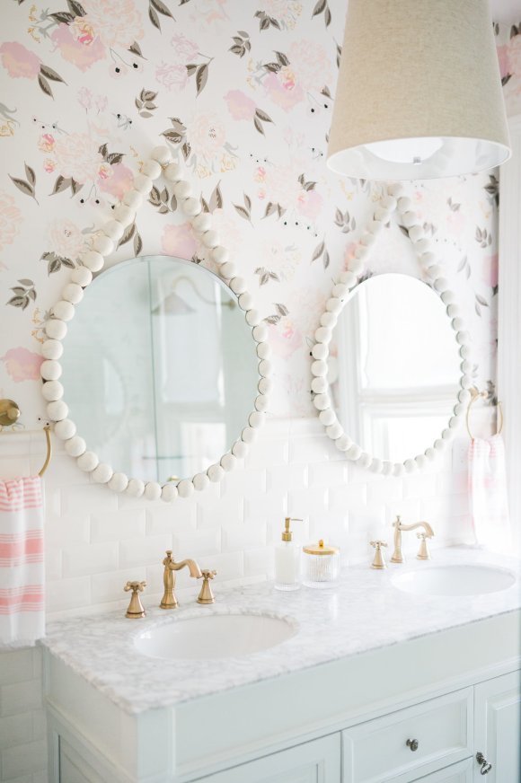 tess-mirror-airy-modern-feminine-bathroom-the-leslie-style-floral-wallpaper
